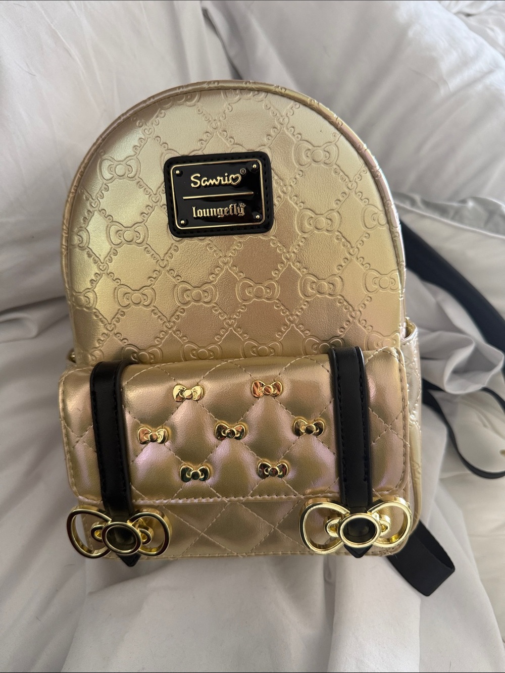 Hello kitty gold backpack